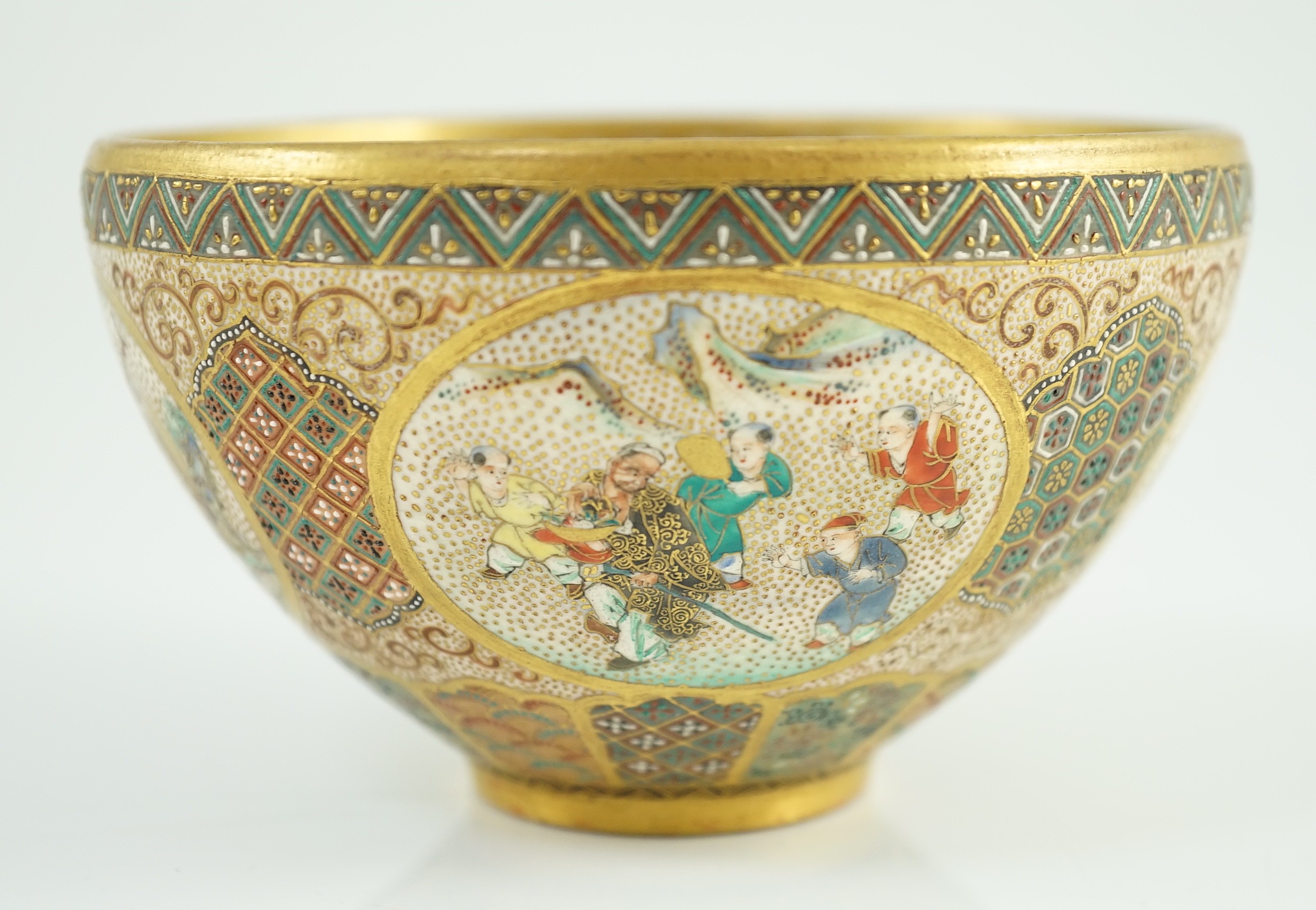 A Japanese Satsuma pottery ‘thousand butterfly’ bowl, Meiji period, 11cm diameter